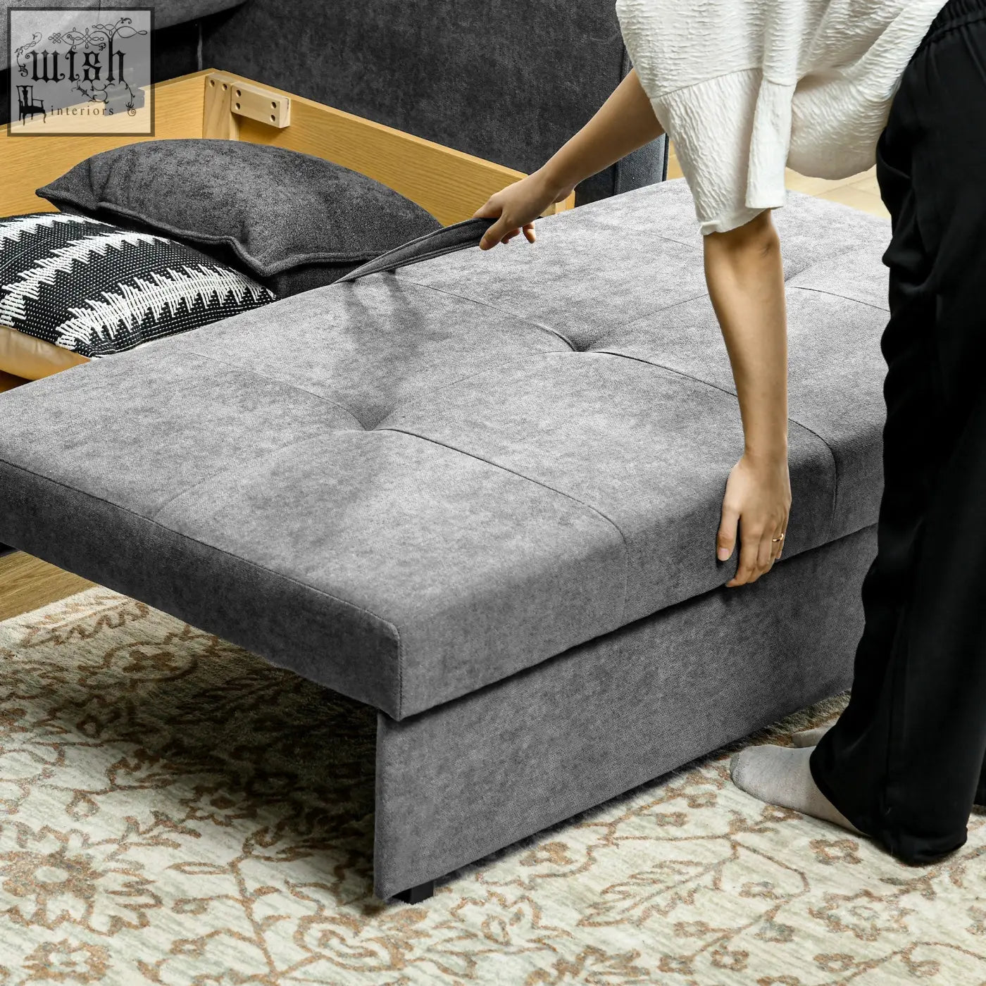 Gray tufted fabric futon with wooden frame in light grey seater sofa bed with hidden storage for living room or guest room