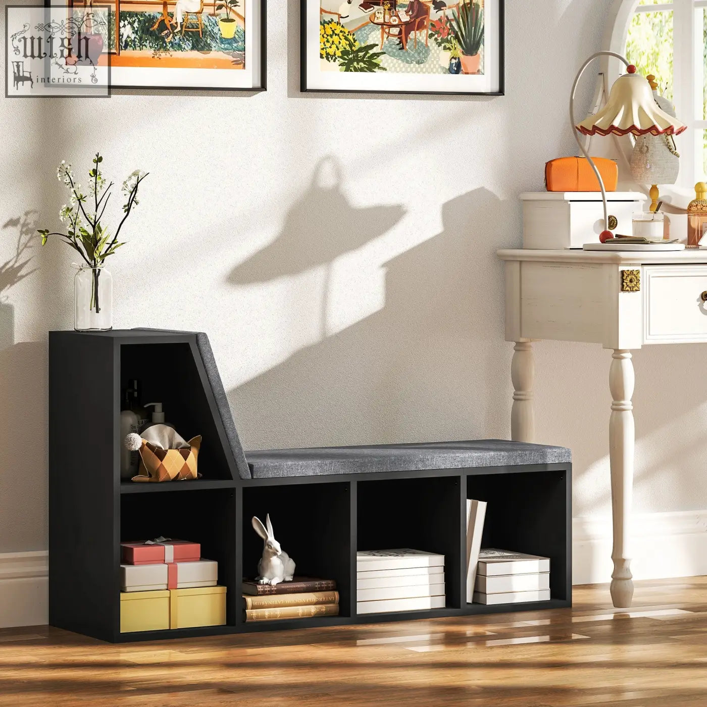 Black storage bench with gray upholstered seat and open cubbies made of particle board for living room 30w x 4hcm