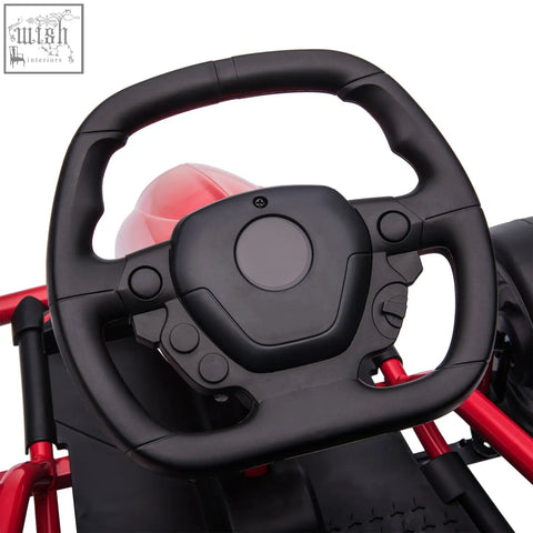 Black plastic steering wheel with red accents and buttons on homcom 24v electric go kart for kids aged 8-12 years