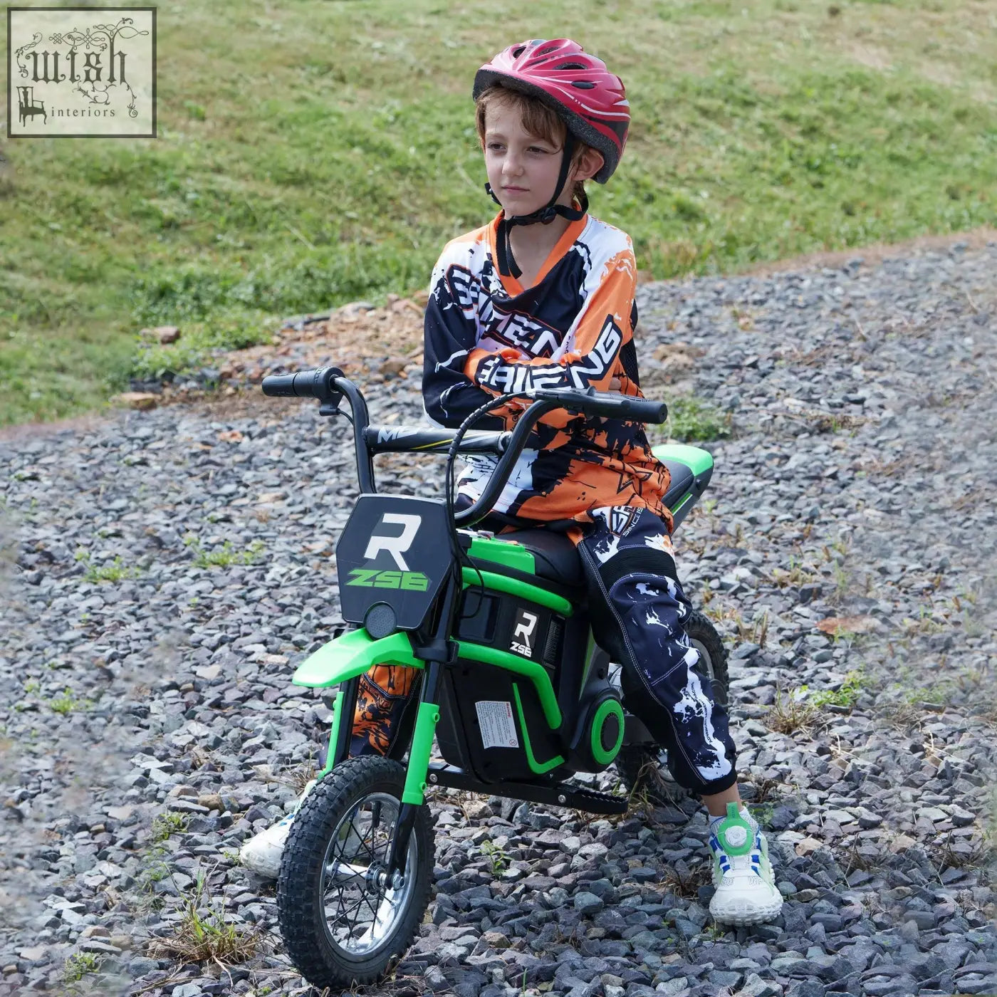 Green and black HOMCOM 24V electric dirt bike for kids with two adjustable speeds and 12 inch pneumatic tyres