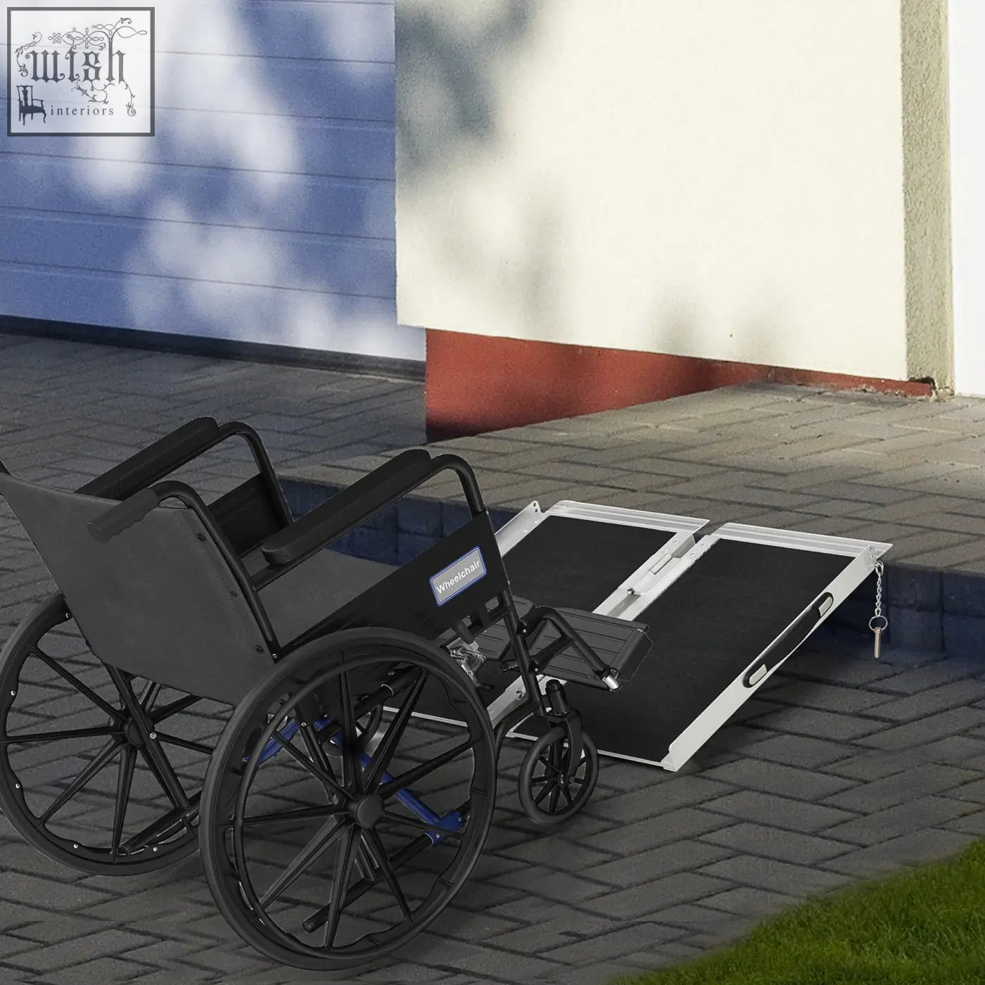 Black wheelchair with blue accents next to a silver and black aluminium alloy wheelchair ramp 61l x 72w for easy mobility access
