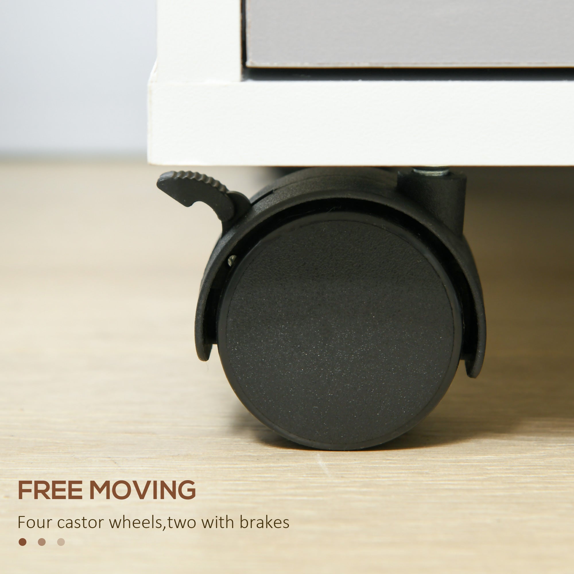 Black castor wheel with textured rubber surface and brake lever on homcom filing cabinet for home office and living room