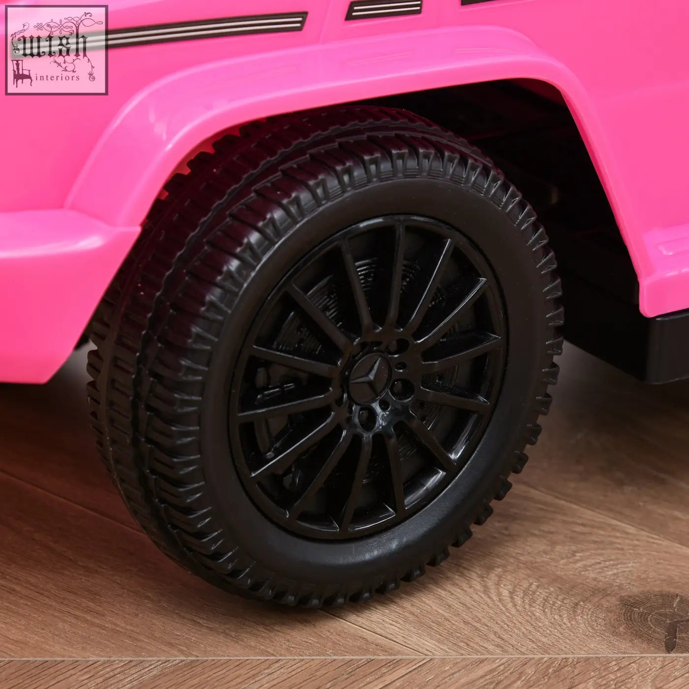 Vibrant pink homcom 3 in 1 kids sliding car with moving steering wheel and black rubber tires featuring mercedes-benz logo