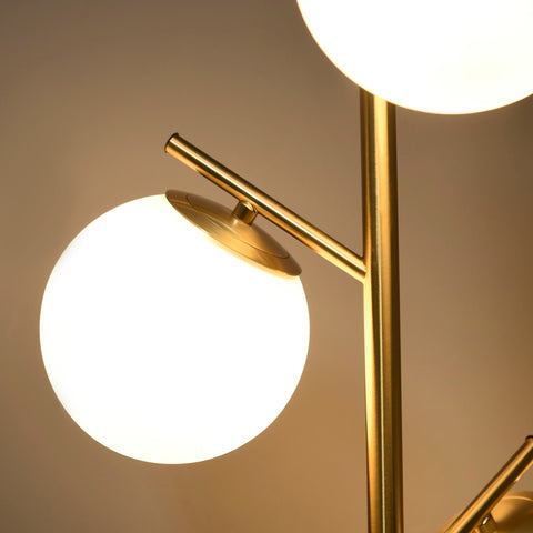 Modern gold finished floor lamp with two glowing white glass globe shades featuring 3000k 4000k 6000k colors and foot switch