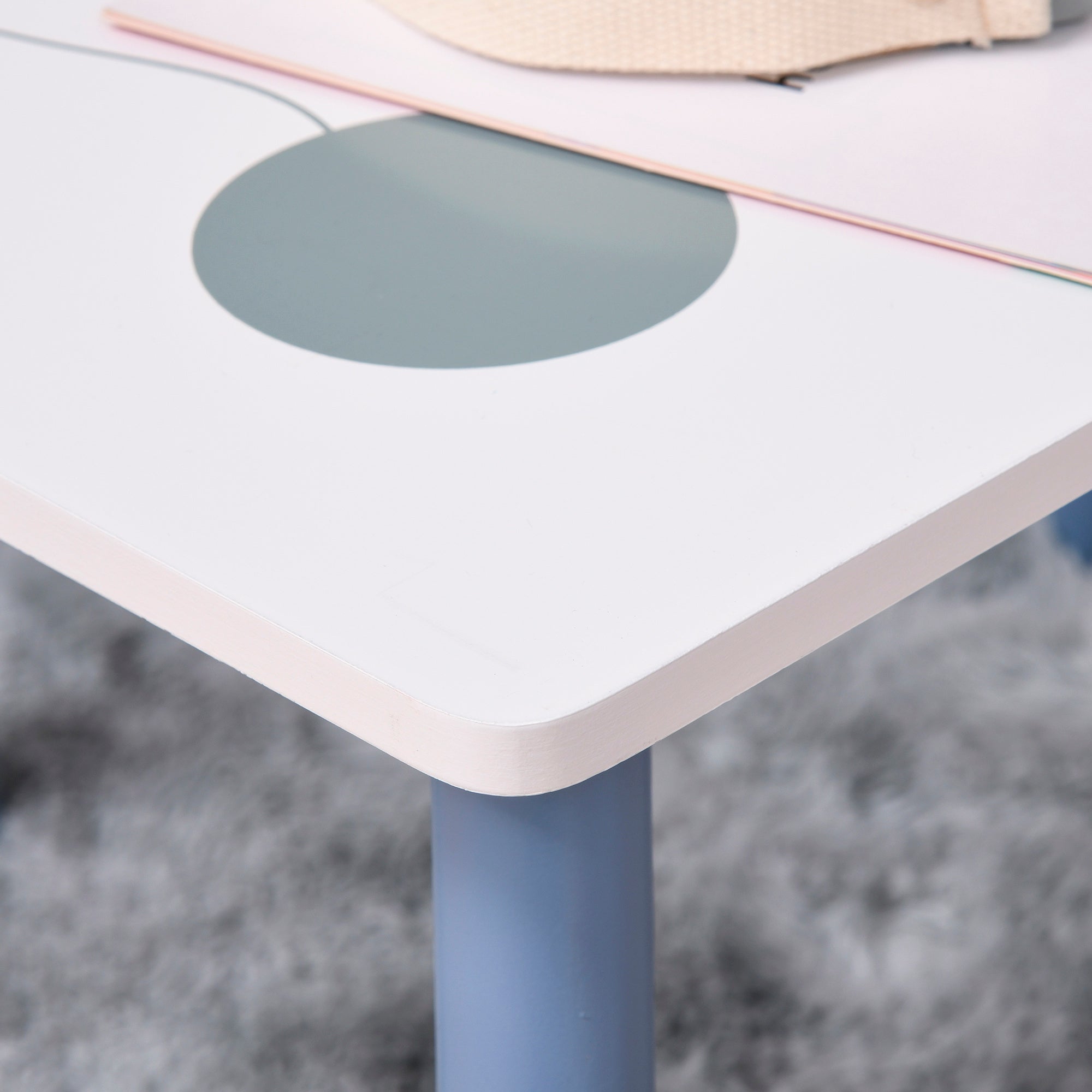 White kids desk with matte finish gray circle design and light blue pine wood legs from homcom 3 pcs set