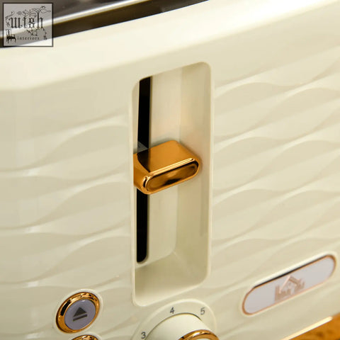Cream-colored 4 slice toaster with gold handle and wave pattern in homcom rapid boil kettle and toaster set beige