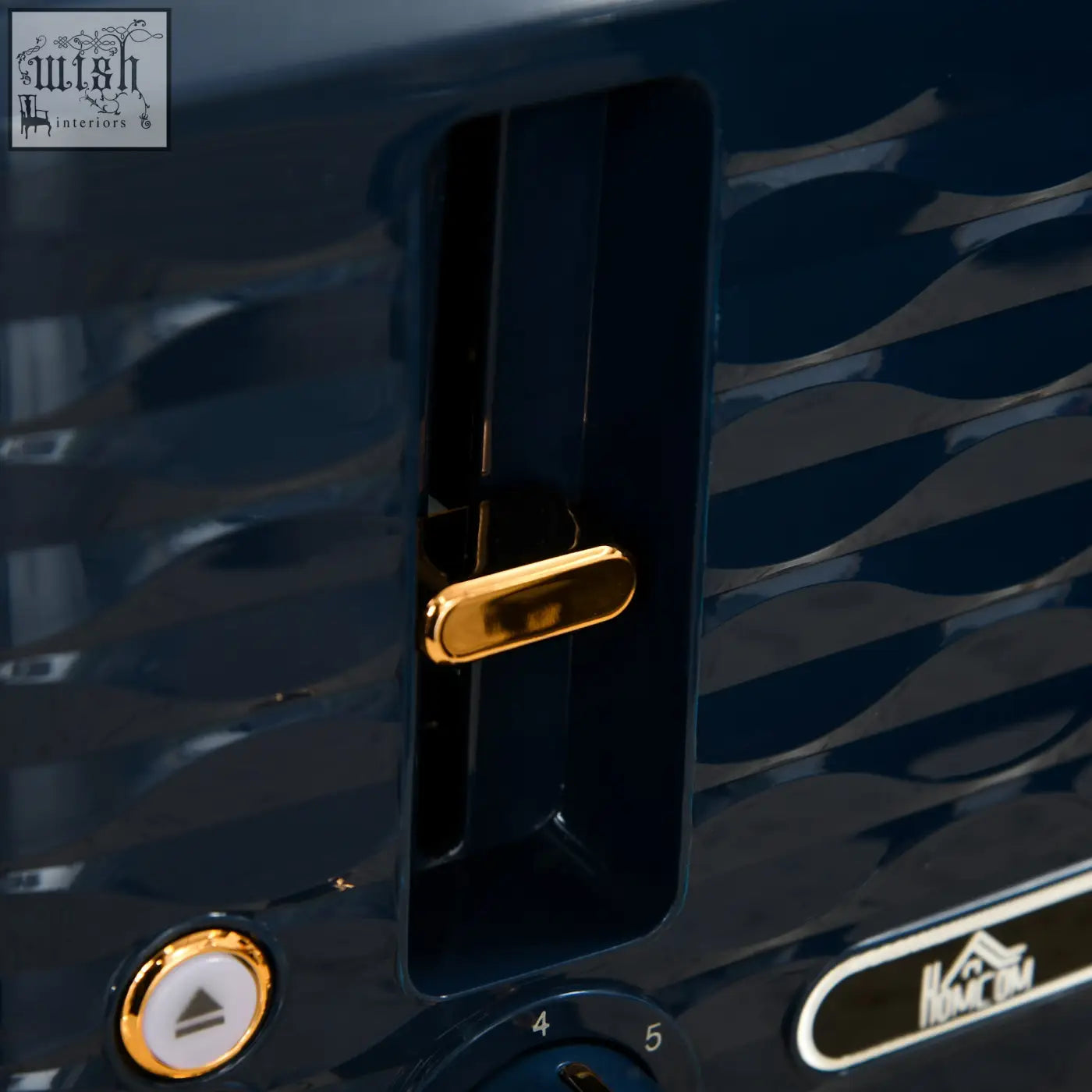 A sleek navy blue 4 slice toaster with gold knobs in the HOMCOM rapid boil kettle and toaster set