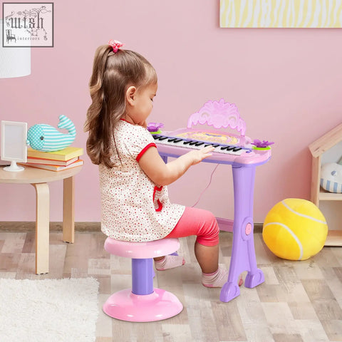Purple and pink plastic electronic keyboard toy with 32 keys and crown top perfect musical instrument for kids en71 7p en62115