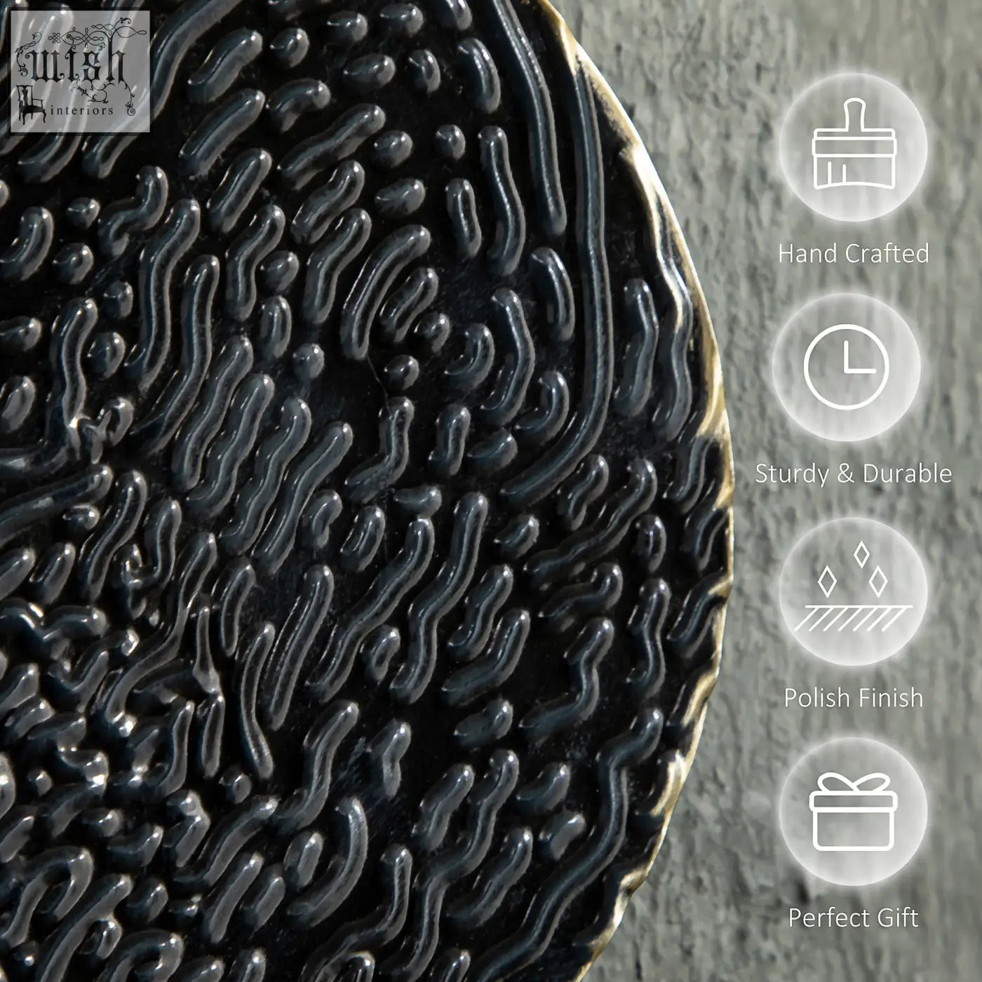 Black handcrafted metal wall art circle with textured wavy pattern and polished finish for blue black gold decor