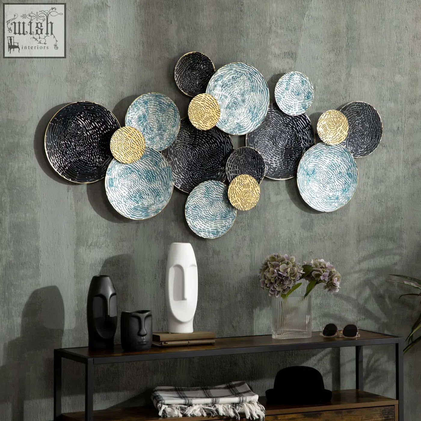 Modern metal wall art with overlapping blue black gold circular plates and woven textures for living room decor