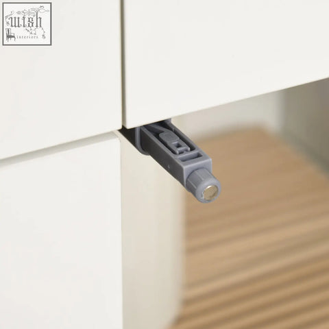 Gray plastic cabinet hinge with textured grip and metallic pivot on high gloss white homcom kitchen cabinet with adjustable shelves