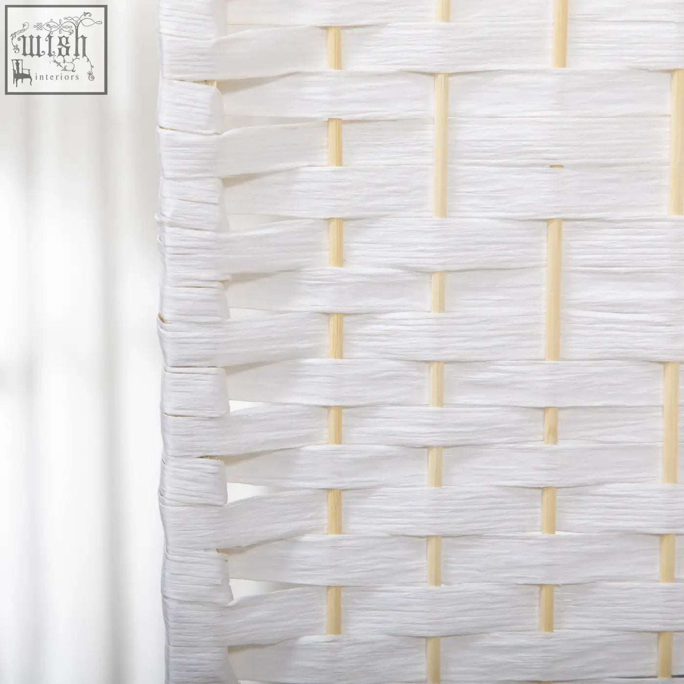 White woven wicker room divider with paper rope texture and wooden frame for privacy in living room or office