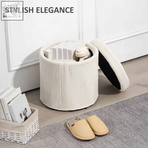 Cream-colored corduroy storage ottoman with ribbed texture and black interior lining perfect as an elegant vanity stool