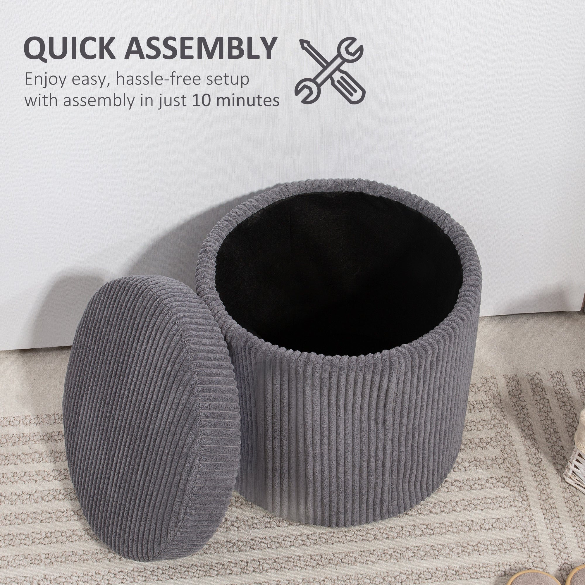 Gray corduroy storage ottoman with ribbed texture and black interior perfect as an elegant vanity stool
