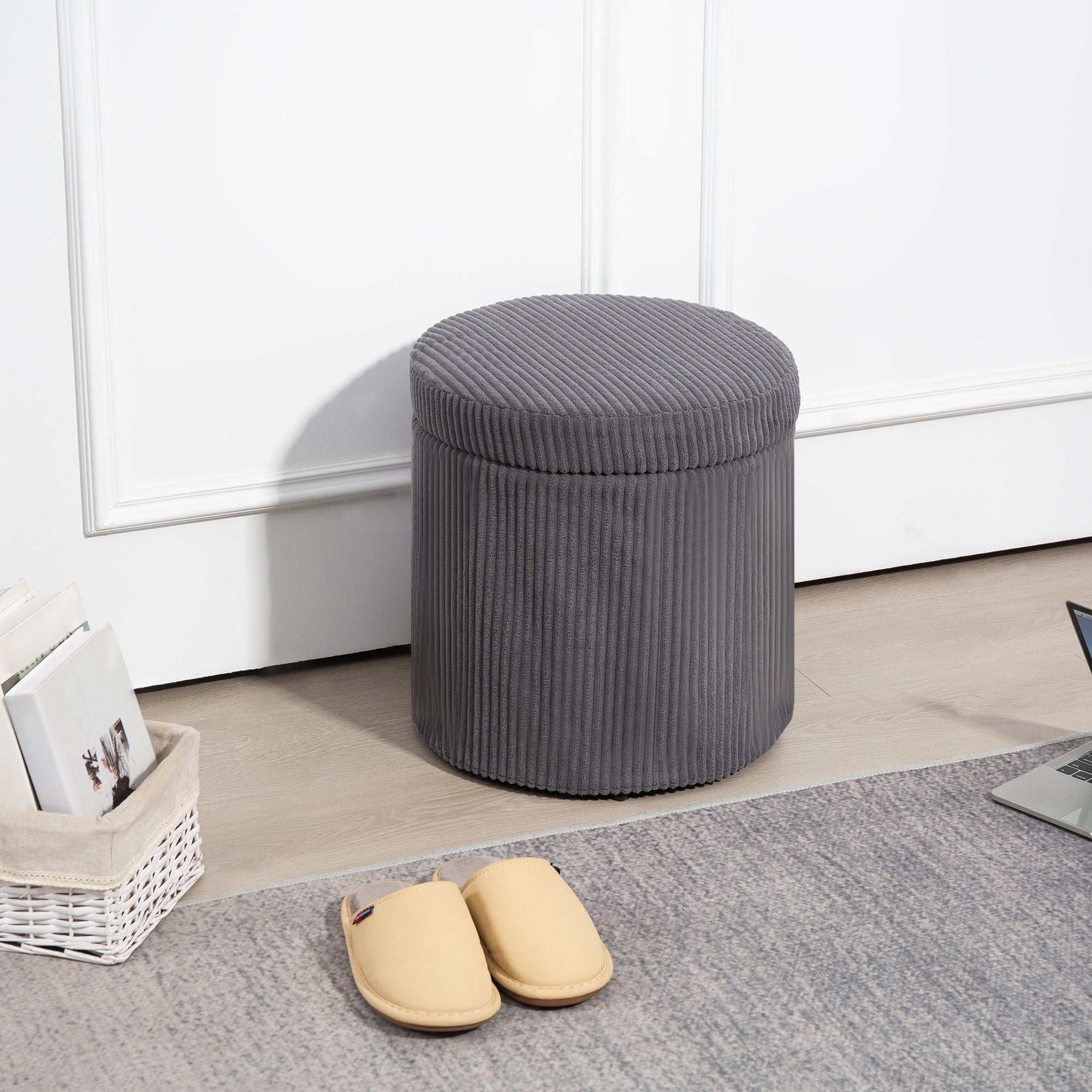 Gray corduroy storage ottoman with removable lid and legs as an elegant vanity stool for living room or bedroom