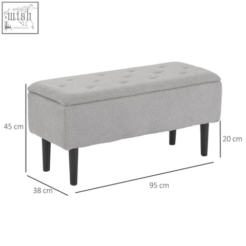 Gray tufted fabric storage ottoman with wooden legs perfect as a small furnishing for bedroom or living room seating