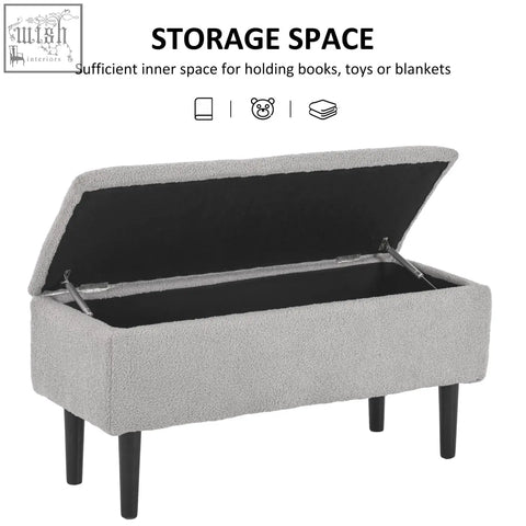Gray upholstered storage ottoman with lift-up lid and wooden legs perfect for small furnishings and storage space