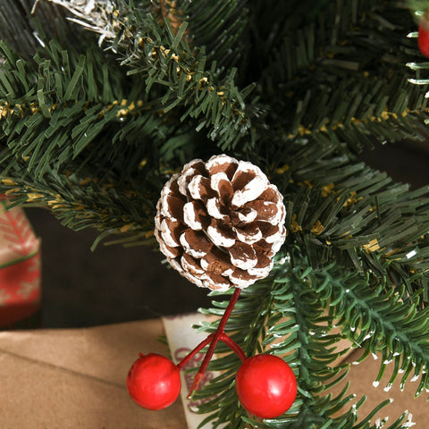 A 4ft homcom christmas tree with white pinecones and red berries featuring a decorative painted pinecone branch