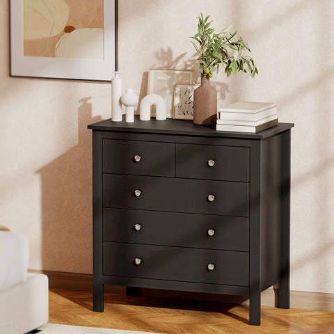 Black wooden mdf construction drawer dresser with four silver knobs perfect for bedroom or living room storage