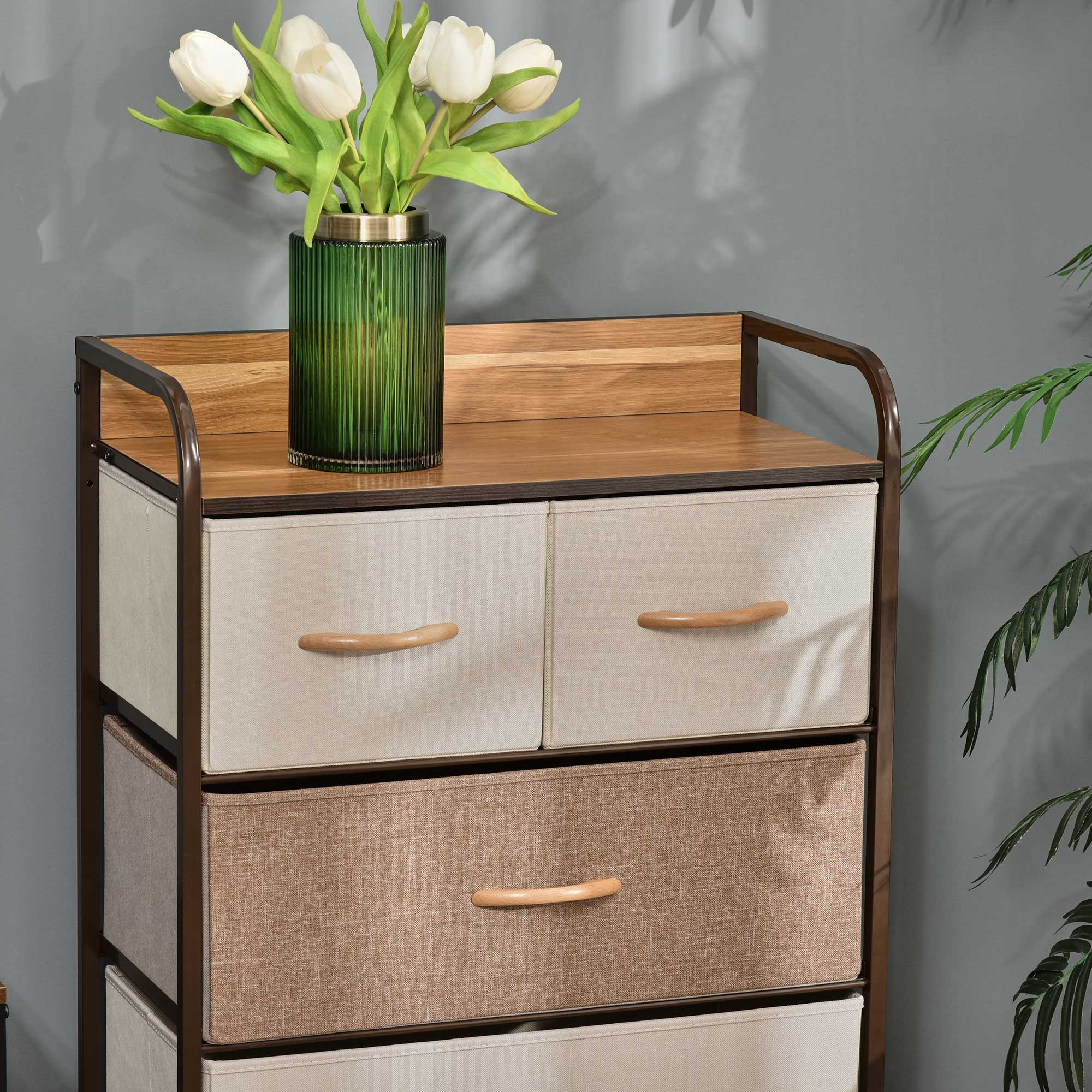 Green ribbed glass vase with white tulips on homcom 5-drawer dresser tower with steel frame and wooden top