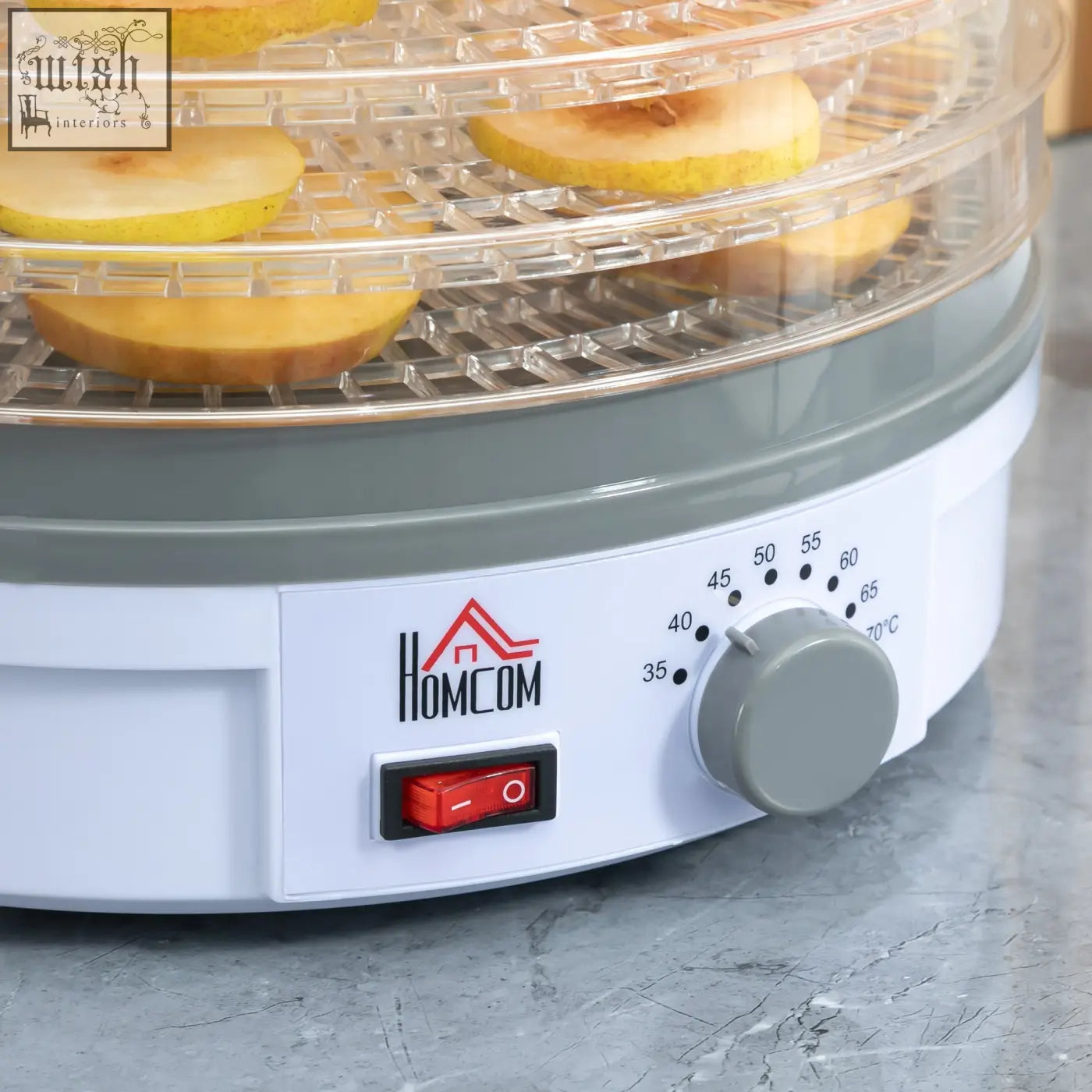 Gray and white homcom 5 tier food dehydrator with five stacking trays and adjustable temperature holding sliced apples