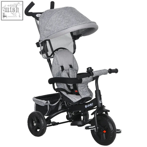 Gray heathered fabric toddler tricycle with black metal frame, three wheels, canopy, safety belt, and parent-push handle