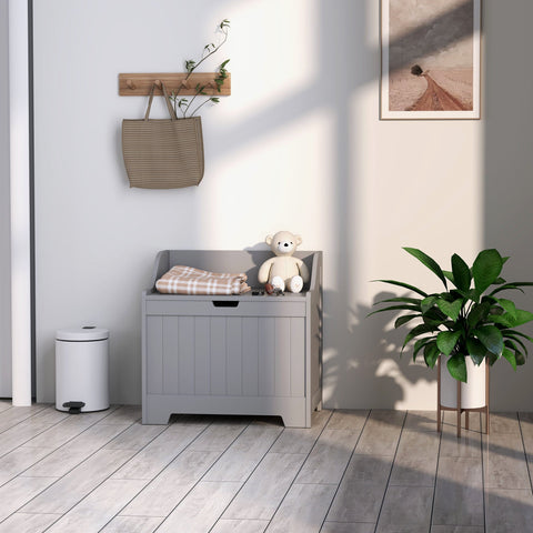 Gray wooden storage chest with planked front and safety hinge keeps your home tidy with a top drawer design