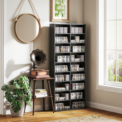 Black metal cd storage unit with multiple shelves made of particle board with melamine coating filled with cds and dvds