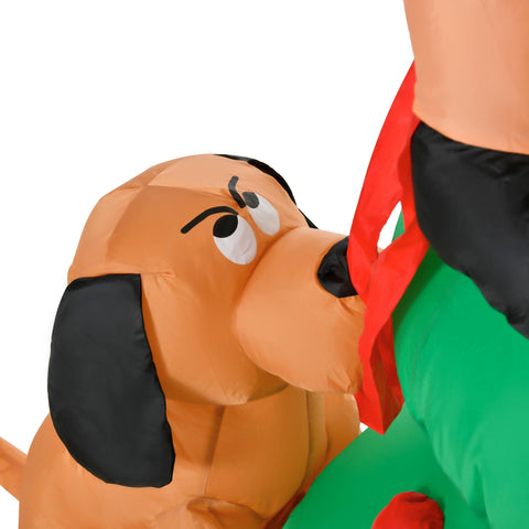Tan inflatable dog with black ears wearing a red scarf made of polyester cloth with led light in santa claus christmas decor