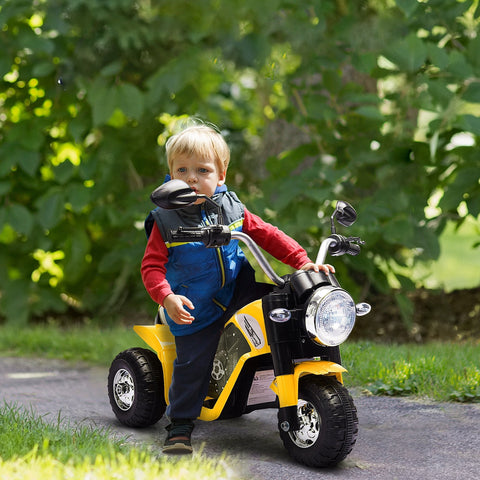Yellow and black homcom 6v kids electric tricycle with forward reverse, large seat to sit comfortably and realistic sounds
