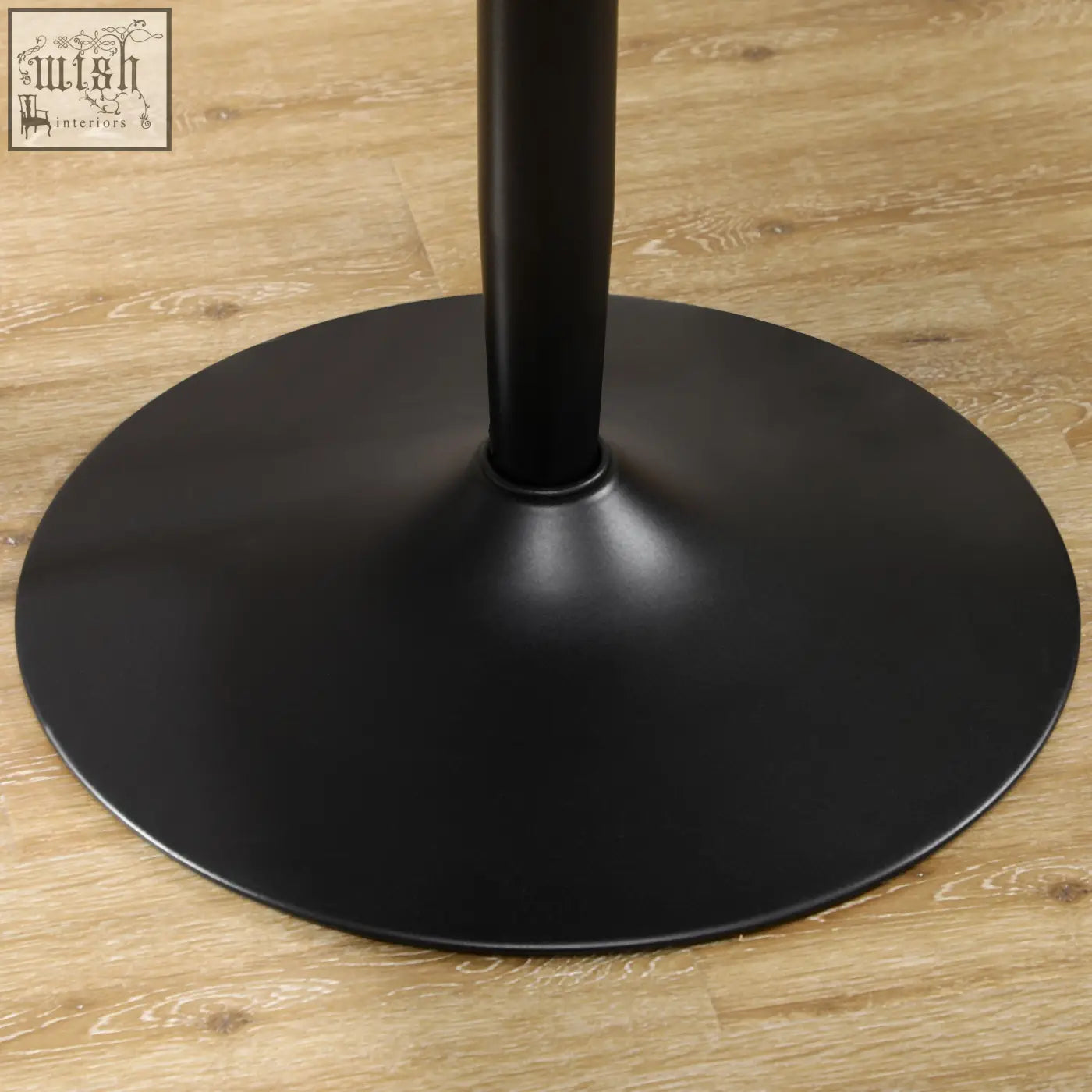 Black matte powder coated steel pedestal base of homcom two-person round table with a sleek minimalistic design