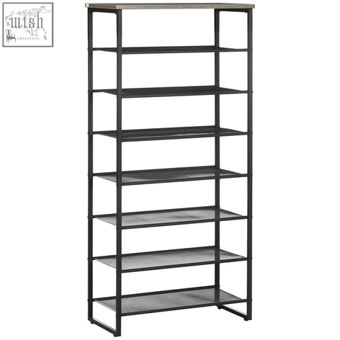 Black metal shelving unit with gray wood top and mesh shelves features a narrow seven-tier design for shoe storage