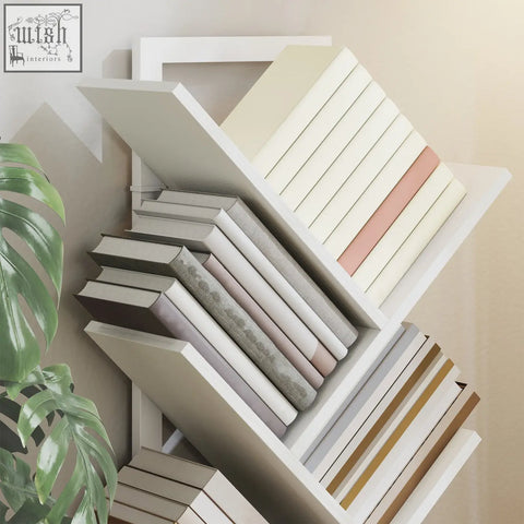 White geometric homcom 9-tier tree bookshelf with steel frame and robust particle board holding books with cream blush pink and gold spines