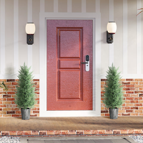 Red textured front door with modern digital lock and black handle next to green artificial cypress trees in decorative pots