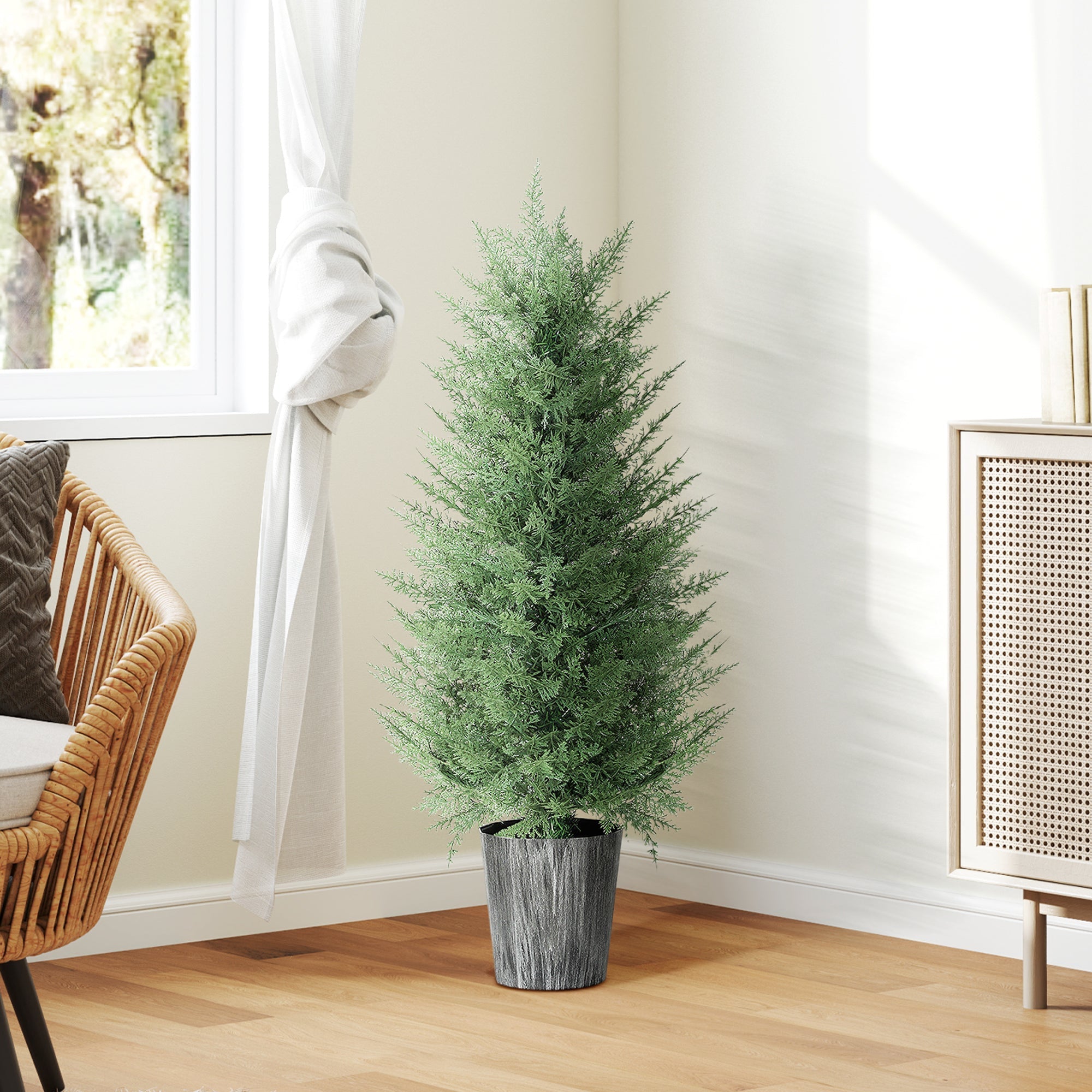 A tall artificial cypress tree with dense green foliage in a textured gray pot perfect for indoor outdoor decor