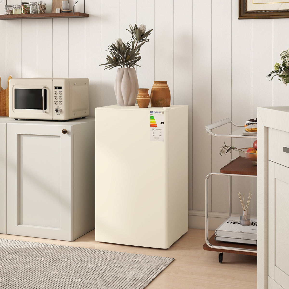 Cream-colored homcom 91 litre small fridge freezer with chiller box and adjustable thermostat in a compact design