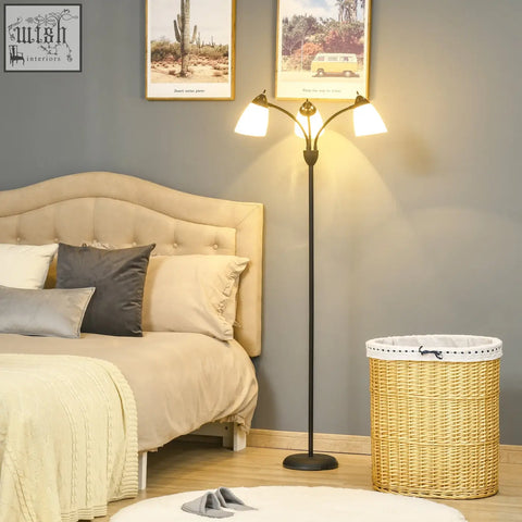Black metal floor lamp with round base steel frame and three warm white adjustable lights for living room or bedroom