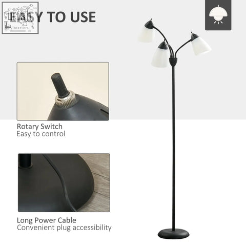 Black homcom arc tree floor lamp with steel frame, curved arms, frosted glass shades, and round base for living room