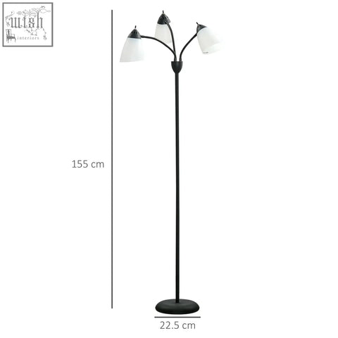 Black three-armed floor lamp with white frosted glass shades and steel frame on round base for living room use