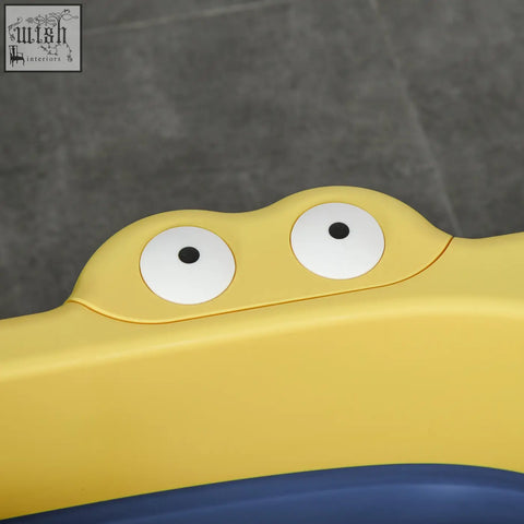 Yellow homcom baby bathtub toy with large white eyes and black pupils featuring smooth curved design for infants
