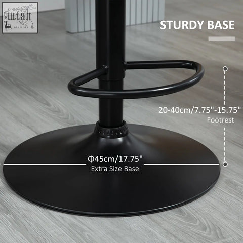 Black metal bar stool with velvet-feel upholstery, round base, metal frame, adjustable height, and footrest in grey