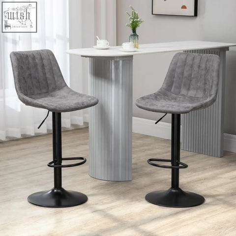 Gray upholstered homcom bar stools with swivel black metal bases and adjustable footrests for kitchen island use