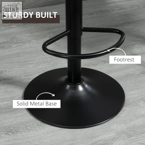 Black metal bar stools with solid circular base and adjustable steel footrest for kitchen island counter use