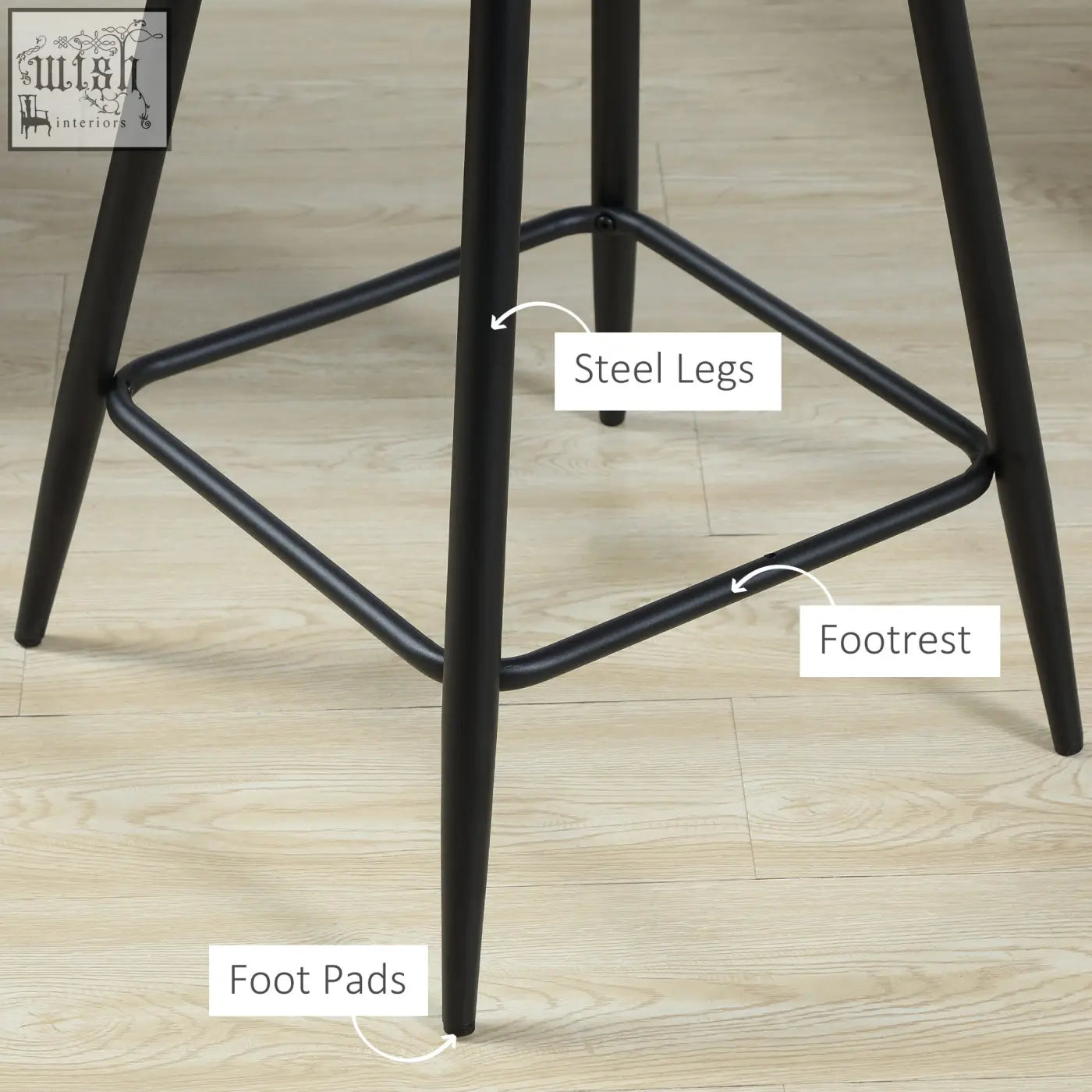 Black steel bar stool with sleek tapered legs and diamond-shaped footrest featuring beautiful velvet-feel upholstery