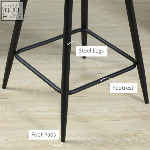 Black steel bar stool with sleek tapered legs and diamond-shaped footrest featuring beautiful velvet-feel upholstery