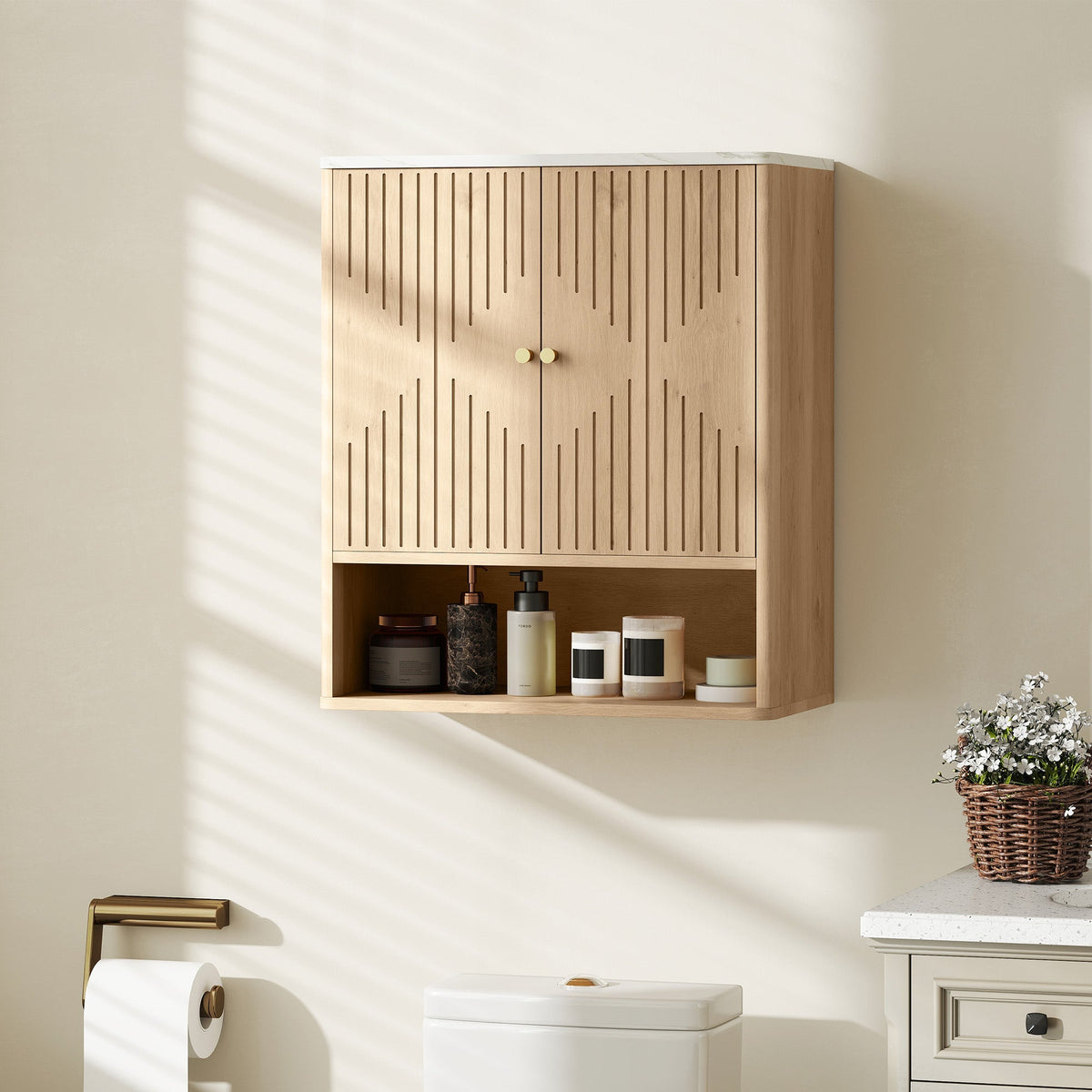 Light wood oak bathroom wall cabinet with vertical slat design and two small round knobs, adjustable shelf inside