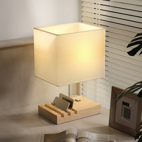 Homcom bedside lamp modern table lamp with cream fabric shade light wood base and built-in phone slots for bedroom