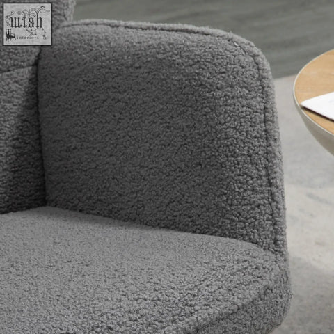 Gray plush armchair with soft textured fabric and curved wooden base rocking chair for gentle rocking in nursery