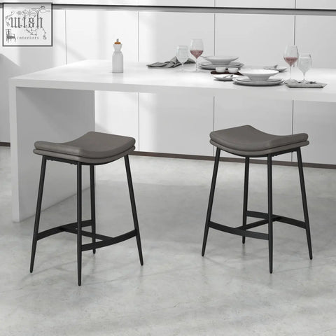 Modern gray upholstered bar stools with steel frame and sleek black legs perfect as breakfast bar stools for kitchen or dining room