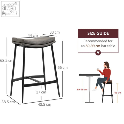 Gray upholstered breakfast bar stools with steel frame black metal legs and supportive footrest for kitchen use